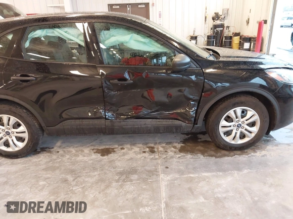 2020 Ford Escape S with VIN 1FMCU0F66LUB67615, listed as a IAAI auction lot 42161163 with 56,819 mi miles and . Bid and sale history available at DreamBid. Image 6.