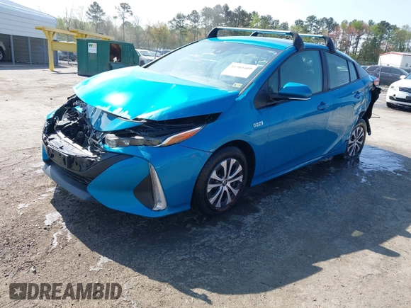2021 Toyota Prius LE with VIN JTDKAMFP7M3180504, listed as a IAAI auction lot 41985409 with 56,617 mi miles and . Bid and sale history available at DreamBid. Image 17.