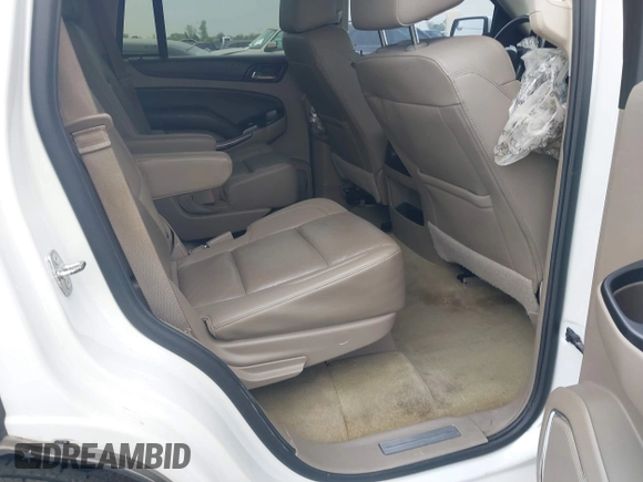 2016 Chevrolet Tahoe LT z VIN 1GNSCBKC4GR359318, wystawiony jako IAAI lot #41866283 z przebiegiem 150 429 mil mil oraz . Historia ofert i sprzedaży dostępna na DreamBid. Obrazek 8.