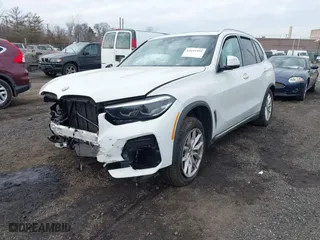 2023 BMW X5 xDrive40i with VIN 5UXCR6C00P9P33221, listed as a IAAI auction lot 41631391 with 19,023 mi miles. Bid and sale history available at carsss.com. Image 2.