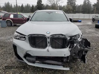 2022 BMW X3 M with VIN 5YM13EC02N9K67297, listed as a Copart auction lot 86645084 with 23,792 mi miles and Salvage Title. Bid and sale history available at carsss.com. Image 5.