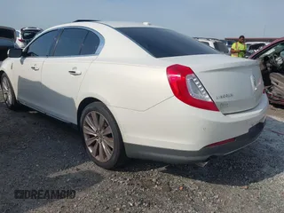 2013 Lincoln MKS EcoBoost with VIN 1LNHL9FT3DG605011, listed as a IAAI auction lot 42018348 with 110,701 mi miles and . Bid and sale history available at DreamBid. Image 3.