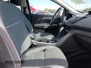 2015 Ford Escape SE with VIN 1FMCU0G75FUB31989, listed as a IAAI auction lot 42040121 with 87,068 mi miles and . Bid and sale history available at DreamBid. Image 5.