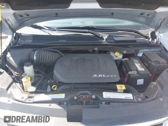 2012 Volkswagen Routan SE with VIN 2C4RVABG7CR309337, listed as a IAAI auction lot 42610070 with 117,214 mi miles and . Bid and sale history available at DreamBid. Image 10.