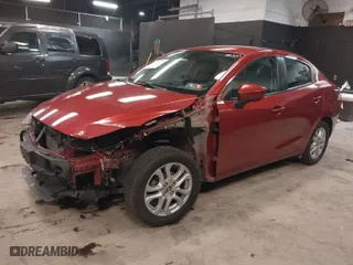2018 Toyota Yaris iA with VIN 3MYDLBYV0JY315135, listed as a IAAI auction lot 41284774 with 64,561 mi miles. Bid and sale history available at carsss.com. Image 2.