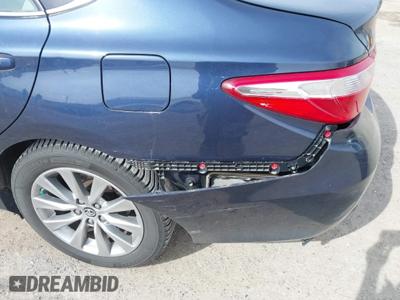 2015 Toyota Camry LE z VIN 4T1BD1FK6FU170842, wystawiony jako IAAI lot #41860403 z przebiegiem 108 482 mil mil oraz . Historia ofert i sprzedaży dostępna na DreamBid. Obrazek 6.