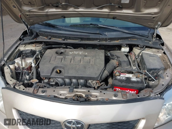 2009 Toyota Corolla with VIN 2T1BU40E99C122004, listed as a IAAI auction lot 42251061 with 210,193 mi miles and . Bid and sale history available at DreamBid. Image 10.