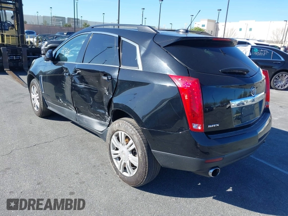 2015 Cadillac SRX z VIN 3GYFNAE32FS543933, wystawiony jako IAAI lot #41578338 z przebiegiem 150 937 mil mil oraz . Historia ofert i sprzedaży dostępna na DreamBid. Obrazek 3.