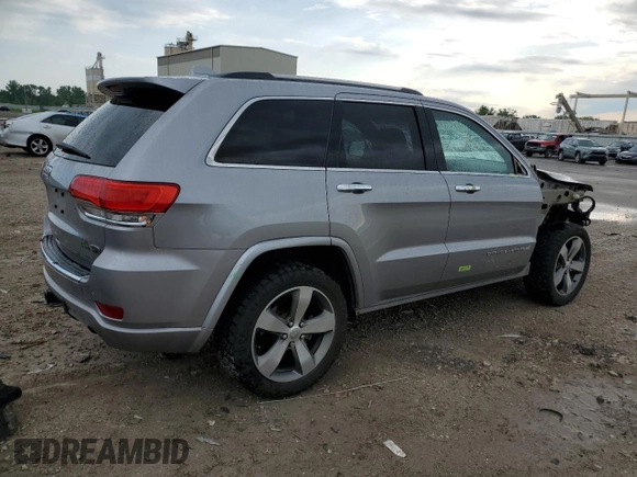 2015 Jeep Grand Cherokee High Altitude with VIN 1C4RJFCG2FC196563, listed as a Copart auction lot 56302315 with 143,759 mi miles and Salvage title. Bid and sale history available at DreamBid. Image 3.