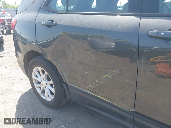 2018 Chevrolet Equinox LS with VIN 2GNAXHEV3J6283707, listed as a IAAI auction lot 42009234 with 115,745 mi miles and . Bid and sale history available at DreamBid. Image 17.