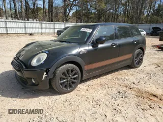 2016 MINI Clubman z VIN WMWLN5C50G2E29737, wystawiony jako Copart lot #50459135 z przebiegiem 129 940 mil mil oraz Szkody całkowita. Historia ofert i sprzedaży dostępna na DreamBid. Obrazek 1.