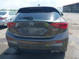 2019 Infiniti QX30 Luxe z VIN SJKCH5CP5KA012022, wystawiony jako IAAI lot #42088799 z przebiegiem 107 381 mil mil oraz . Historia ofert i sprzedaży dostępna na DreamBid. Obrazek 16.