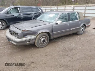 1992 Chrysler New Yorker z VIN 1C3XV66L3ND861794, wystawiony jako IAAI lot #41844564 z przebiegiem 68 016 mil mil oraz . Historia ofert i sprzedaży dostępna na DreamBid. Obrazek 2.
