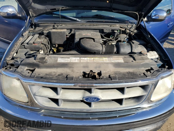1998 Ford F-150 XL с VIN 1FTRX17L8WNA77509, выставлен на аукционе Copart как лот 80331234 с пробегом 81 664 миль миль и Списание • Salvage title. История ставок и продаж доступна на DreamBid. Изображение 12.