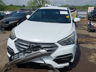 2017 Hyundai Santa Fe 2.4L z VIN 5XYZTDLB3HG439072, wystawiony jako IAAI lot #42061127 z przebiegiem 145 864 mil mil oraz . Historia ofert i sprzedaży dostępna na DreamBid. Obrazek 6.