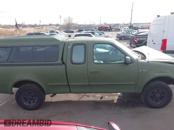 1997 Ford F-150 XL with VIN 1FTDX1861VKA60604, listed as a IAAI auction lot 41060909 with 269,715 mi miles. Bid and sale history available at carsss.com. Image 13.