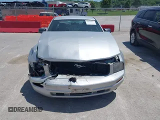 2007 Ford Mustang Deluxe z VIN 1ZVFT80N275244240, wystawiony jako IAAI lot #42279817 z przebiegiem 204 840 mil mil oraz . Historia ofert i sprzedaży dostępna na DreamBid. Obrazek 12.