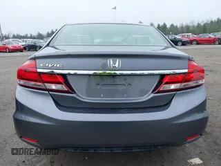 2014 Honda Civic Sedan LX with VIN 2HGFB2F53EH541941, listed as a IAAI auction lot 42033294 with 104,006 mi miles. Bid and sale history available at carsss.com. Image 17.