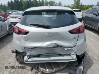 2019 Mazda CX-3 Touring z VIN JM1DKFC76K1451342, wystawiony jako Copart lot #58413935 z przebiegiem 21 391 mil mil oraz Szkoda całkowita • Salvage title. Historia ofert i sprzedaży dostępna na DreamBid. Obrazek 6.