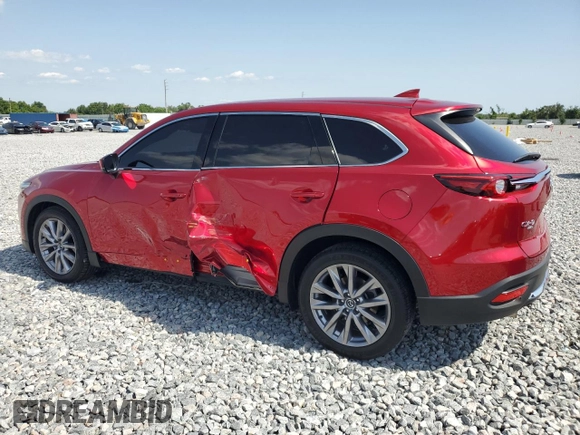 2023 Mazda CX-9 Grand Touring z VIN JM3TCBDY4P0633408, wystawiony jako Copart lot #57242685 z przebiegiem 28 859 mil mil oraz Szkoda całkowita • Salvage title. Historia ofert i sprzedaży dostępna na DreamBid. Obrazek 2.