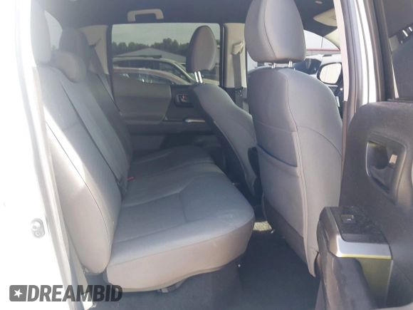 2023 Toyota Tacoma SR with VIN 3TYCZ5AN2PT112854, listed as a IAAI auction lot 42220025 with 43,657 mi miles and . Bid and sale history available at DreamBid. Image 8.