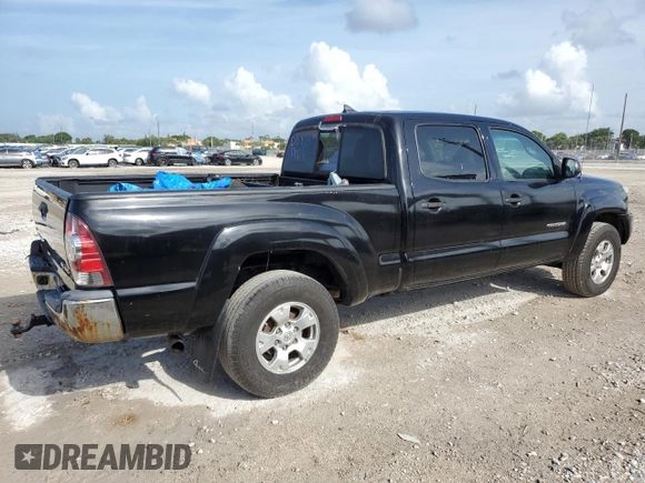 2015 Toyota Tacoma с VIN 3TMMU4FN6FM073394, выставлен на аукционе Copart как лот 64592495 с пробегом 156 753 миль миль и Списание • Salvage title. История ставок и продаж доступна на DreamBid. Изображение 3.
