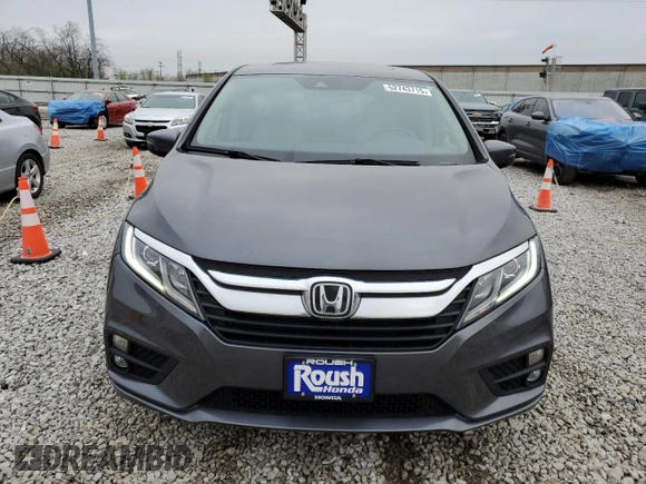 2018 Honda Odyssey EX-L with VIN 5FNRL6H78JB091153, listed as a Copart auction lot 52743715 with 69,849 mi miles and Salvage Title. Bid and sale history available at DreamBid. Image 5.