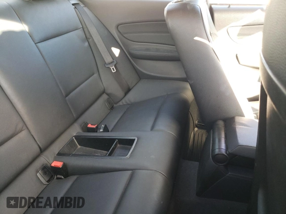 2009 BMW 1 Series 128i with VIN WBAUP73529VK75976, listed as a Copart auction lot 75642404 with 131,653 mi miles and Salvage Title. Bid and sale history available at carsss.com. Image 10.