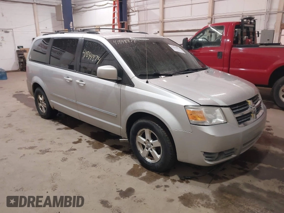 2008 Dodge Grand Caravan SXT with VIN 1D8HN54P18B129536, listed as a IAAI auction lot 41844874 with 260,000 mi miles and . Bid and sale history available at DreamBid. Image 1.