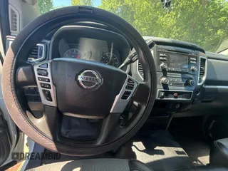 2017 Nissan Titan SV with VIN 1N6AA1EJ7HN539154, listed as a Copart auction lot 55880185 with 133,933 mi miles and Clean Title. Bid and sale history available at DreamBid. Image 9.