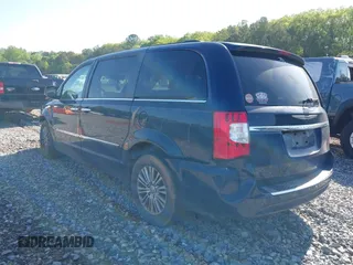 2013 Chrysler Town & Country Touring-L with VIN 2C4RC1CG7DR661162, listed as a IAAI auction lot 42026629 with 180,064 mi miles. Bid and sale history available at carsss.com. Image 3.