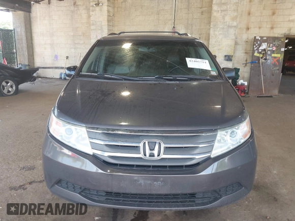 2012 Honda Odyssey EX-L with VIN 5FNRL5H67CB016934, listed as a IAAI auction lot 42405714 with 248,512 mi miles and . Bid and sale history available at DreamBid. Image 12.