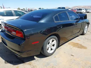 2013 Dodge Charger SE with VIN 2C3CDXBG8DH628382, listed as a IAAI auction lot 41850950 with 252,392 mi miles and . Bid and sale history available at DreamBid. Image 4.