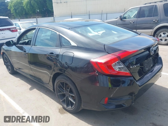 2019 Honda Civic Sedan LX with VIN 2HGFC2F61KH510012, listed as a IAAI auction lot 42073212 with 86,487 mi miles. Bid and sale history available at carsss.com. Image 3.
