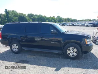 2013 Chevrolet Suburban LT with VIN 1GNSCJE03DR121628, listed as a IAAI auction lot 42629432 with 223,761 mi miles and . Bid and sale history available at DreamBid. Image 13.