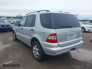 2004 Mercedes-Benz M-Class 3.5L with VIN 4JGAB57E24A490997, listed as a IAAI auction lot 41954815 with 226,635 mi miles. Bid and sale history available at carsss.com. Image 3.