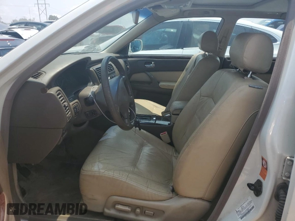 1999 Infiniti Q45 z VIN JNKBY31A2XM603477, wystawiony jako Copart lot #64216924 z przebiegiem 278 602 mil mil oraz Szkody całkowita. Historia ofert i sprzedaży dostępna na DreamBid. Obrazek 7.