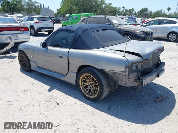 2003 Mazda MX-5 Miata Cloth with VIN JM1NB353930311340, listed as a IAAI auction lot 42145967 with 194,740 mi miles and . Bid and sale history available at DreamBid. Image 3.