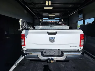2022 Ram 2500 Tradesman z VIN 3C6UR5HL8NG437418, wystawiony jako IAAI lot #42414789 z przebiegiem 81 498 mil mil oraz . Historia ofert i sprzedaży dostępna na DreamBid. Obrazek 1.