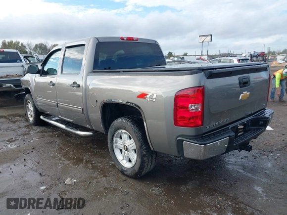 2013 Chevrolet Silverado 1500 LT with VIN 3GCPKSE70DG232285, listed as a IAAI auction lot 40881769 with 110,837 mi miles and . Bid and sale history available at DreamBid. Image 3.