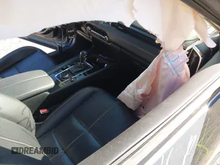 2023 Mazda CX-50 S Premium Plus with VIN 7MMVABEM8PN108020, listed as a IAAI auction lot 42203568 with 26,783 mi miles and . Bid and sale history available at DreamBid. Image 5.