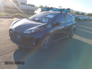 2018 Toyota Prius One with VIN JTDKDTB37J1605828, listed as a IAAI auction lot 41310761 with 85,079 mi miles and . Bid and sale history available at DreamBid. Image 2.