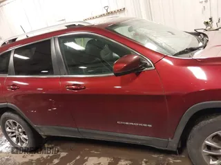 2019 Jeep Cherokee Latitude Plus with VIN 1C4PJMLB2KD198561, listed as a IAAI auction lot 41731691 with 71,129 mi miles. Bid and sale history available at carsss.com. Image 14.