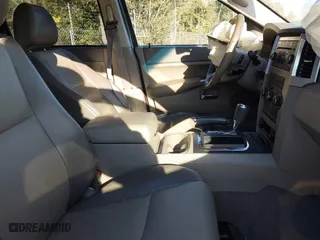 2009 Jeep Grand Cherokee Laredo with VIN 1J8GS48K79C516320, listed as a IAAI auction lot 41353131 with 166,739 mi miles. Bid and sale history available at carsss.com. Image 5.