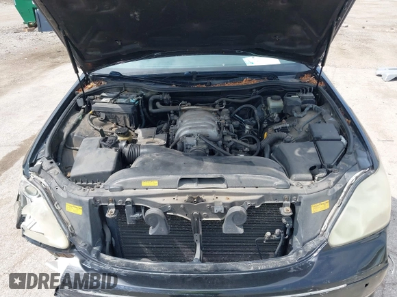 2004 Lexus LS 430 with VIN JTHBN36F740124200, listed as a IAAI auction lot 42146256 with 256,986 mi miles. Bid and sale history available at carsss.com. Image 10.