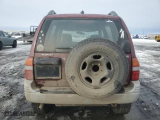 1999 Suzuki Grand Vitara JLX with VIN JS3TD62V6X4108950, listed as a Copart auction lot 46468705 with 215,541 mi miles and Salvage Title. Bid and sale history available at carsss.com. Image 6.