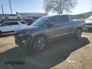 2017 Honda Ridgeline RTL-T with VIN 5FPYK2F61HB008598, listed as a Copart auction lot 42034415 with 127,346 mi miles and Salvage title. Bid and sale history available at DreamBid. Image 1.