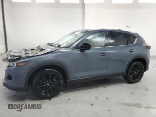 2023 Mazda CX-5 S Carbon Edition z VIN JM3KFBCM6P0193242, wystawiony jako Copart lot #46644825 z przebiegiem 53 665 mil mil oraz Szkody całkowita. Historia ofert i sprzedaży dostępna na DreamBid. Obrazek 1.