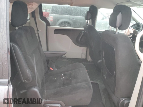 2016 Dodge Grand Caravan SE Plus z VIN 2C4RDGBG9GR196020, wystawiony jako Copart lot #59126905 z przebiegiem 164 844 mil mil oraz Szkoda całkowita • Salvage title. Historia ofert i sprzedaży dostępna na DreamBid. Obrazek 11.