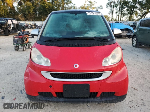 2011 Smart fortwo Pure с VIN WMEEJ3BAXBK421243, выставлен на аукционе Copart как лот 78536584 с пробегом 64 858 миль миль и На запчасти • Non repairable. История ставок и продаж доступна на DreamBid. Изображение 5.